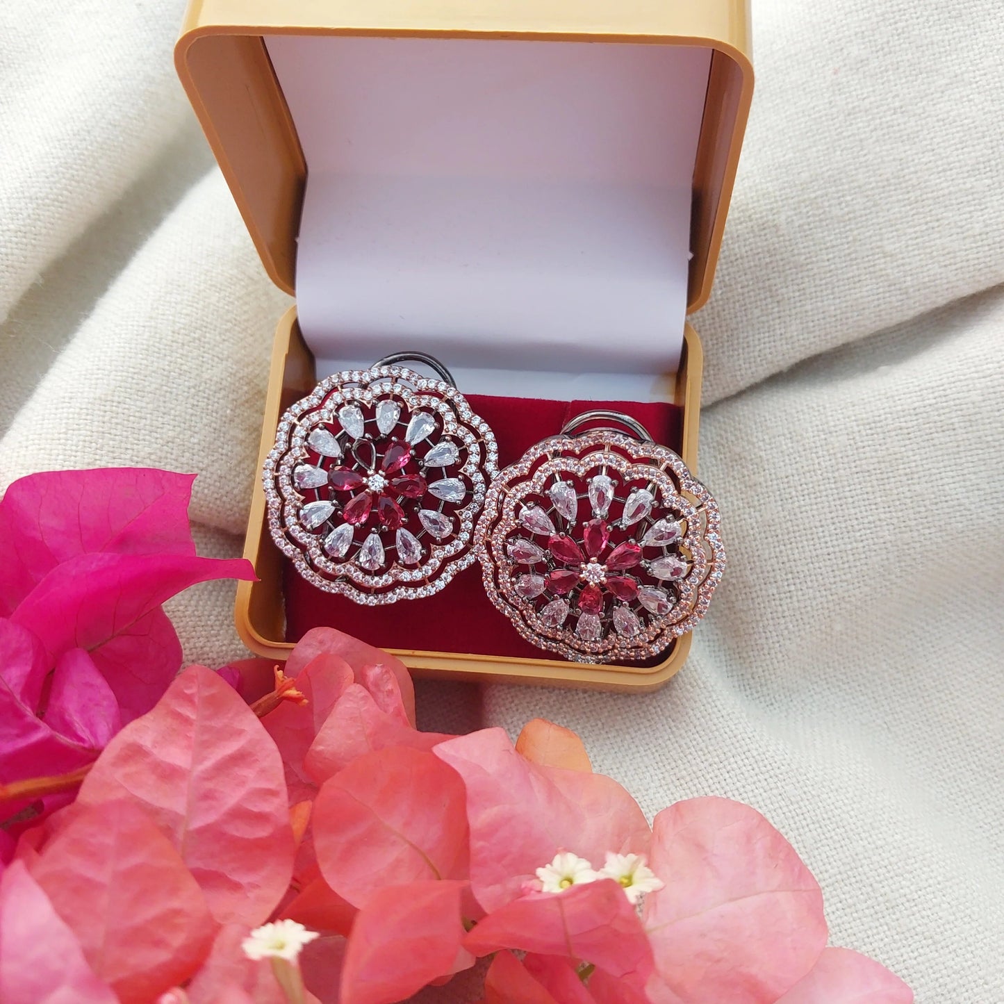 RAJAS American Diamond Flower Shape AD Red Stone Rose Gold Plated Stud Earrings .
