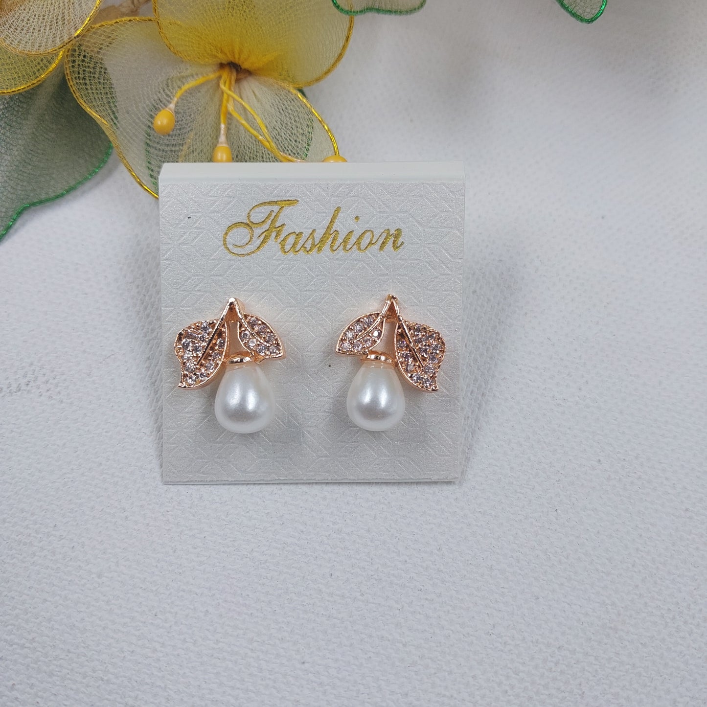 RAJAS American Diamond AD Leaf Shape Rose Gold Polish Earring with White Pearl