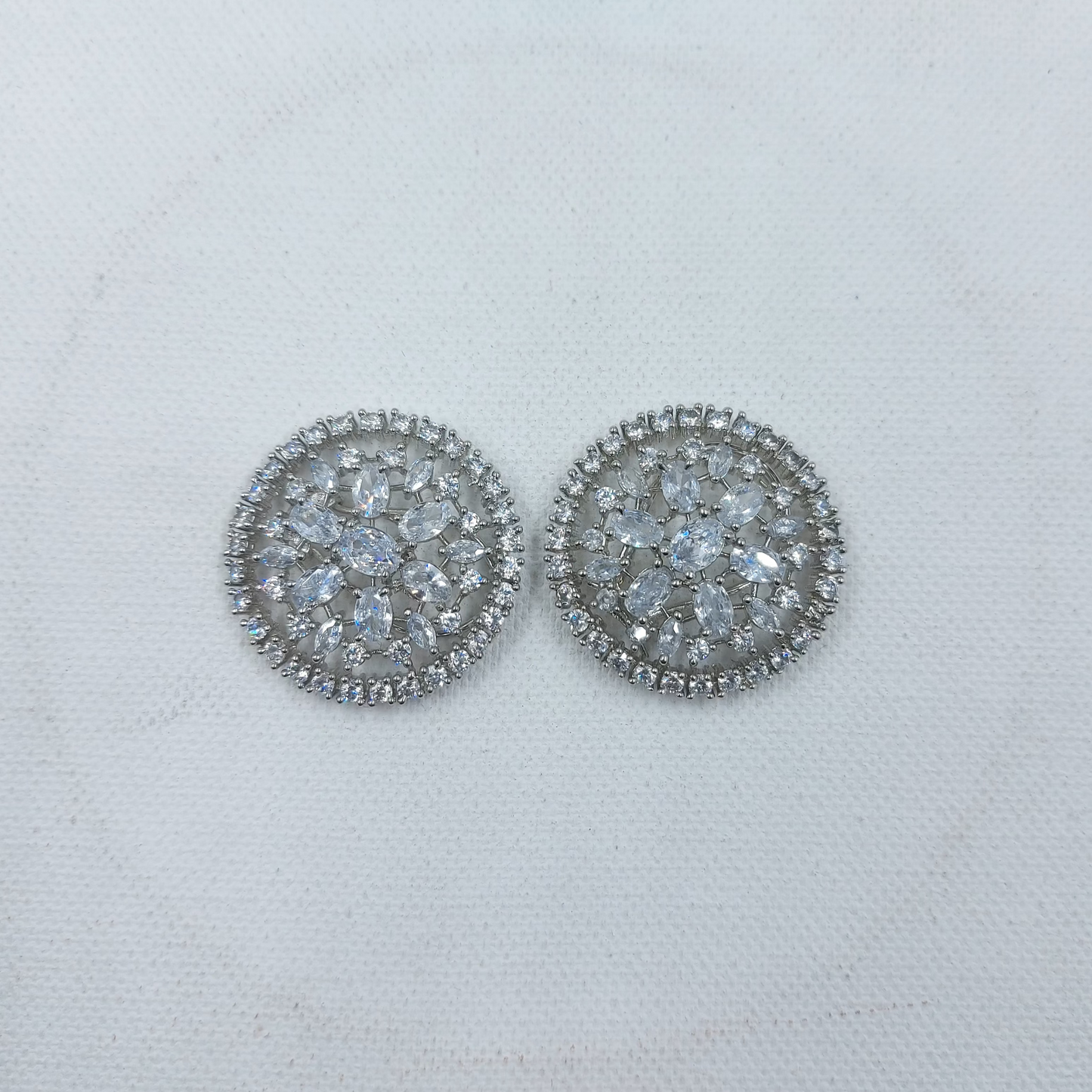 Buy Clear American Diamond AD Sliver Polish Round Shape Stud Earrings
